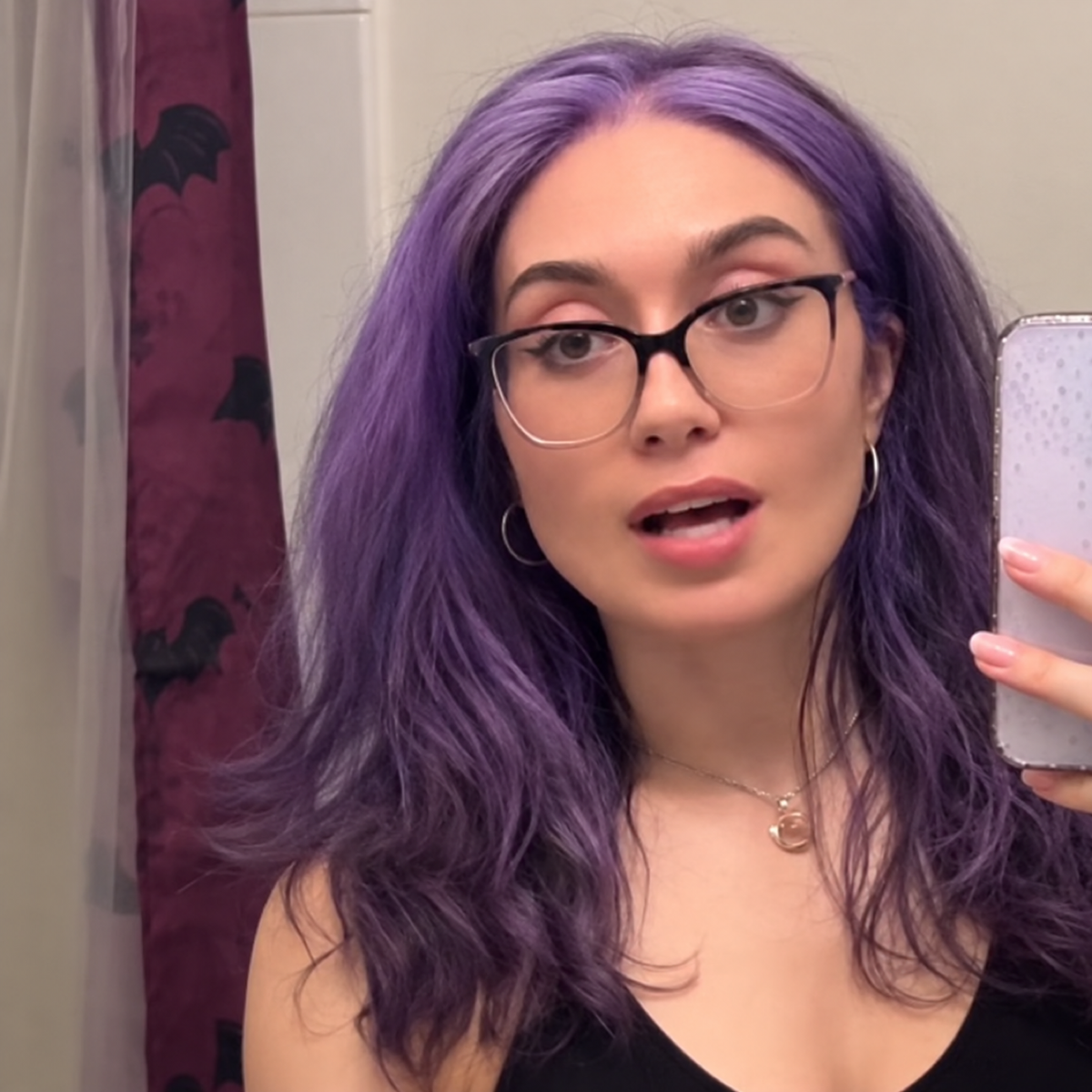 Woman with purple hair after temporary colour